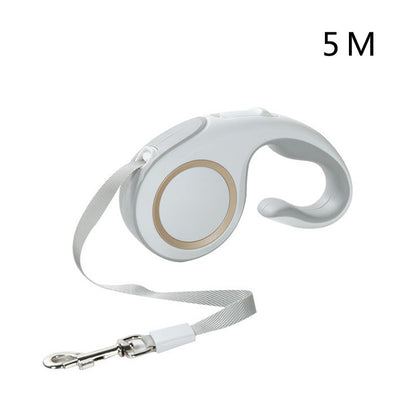 Retractable dog leash with white handle and silver clip on a white background, labeled '5M'.