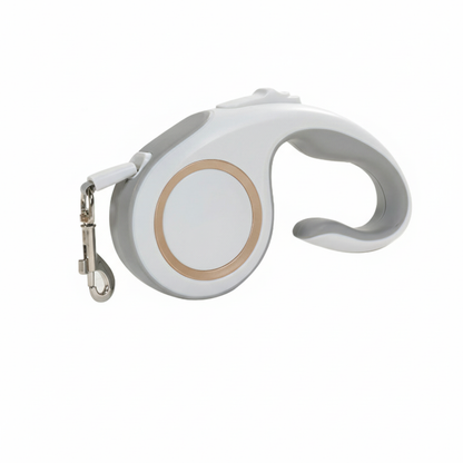 Retractable dog leash with white handle and beige accents on a white background