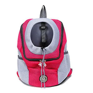 Pink and gray pet carrier backpack on a white background