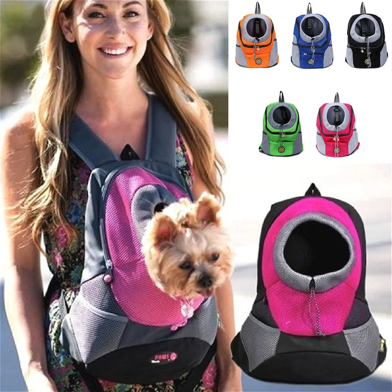 Woman carrying a small dog in a pink and gray pet carrier with additional pet carriers in different colors displayed.