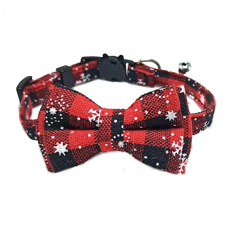 Red and black checkered bow tie with star patterns on a white background