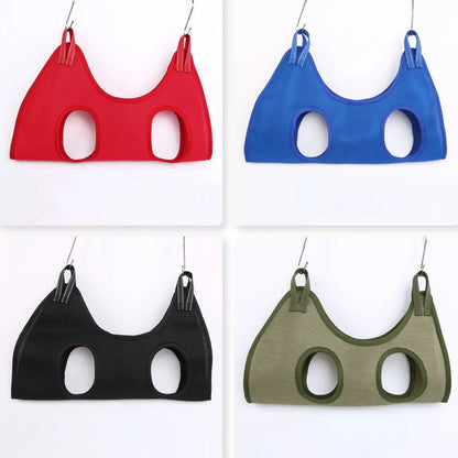 Four sports bras in red, blue, black, and green hanging on a white background.