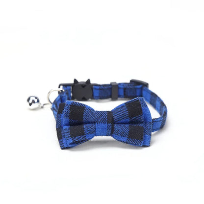 Blue and black checkered bow tie cat collar on a white background