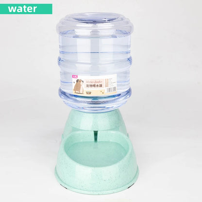 Pet water dispenser with a clear container and green base on a white background