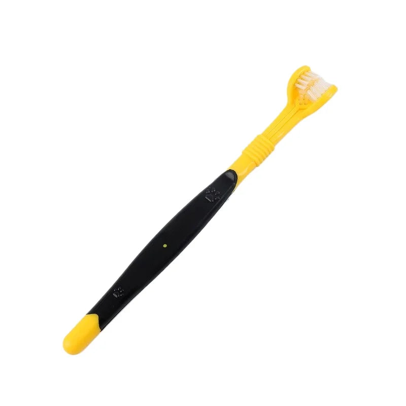 Yellow and black toothbrush on a white background