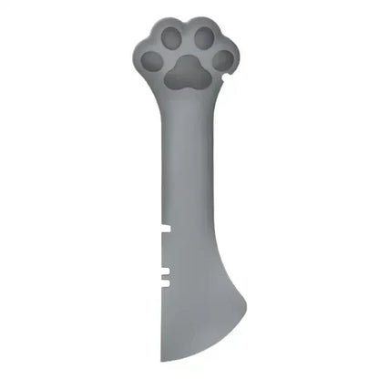 Gray tool with a paw print design on a white background