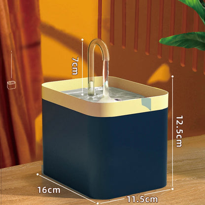Blue and gold container with dimensions on a wooden surface