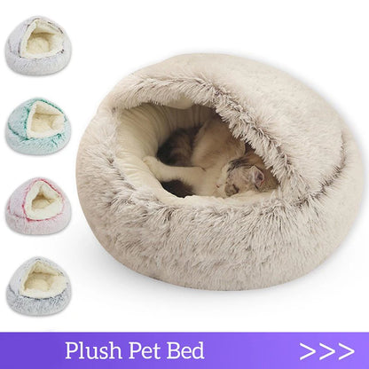 Plush pet bed with a cat inside on a white background