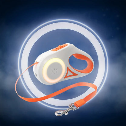 Retractable dog leash with white and orange design on a dark blue background