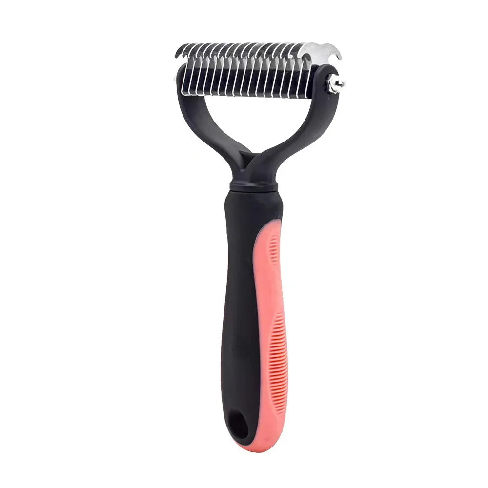 Pet grooming tool with black and pink handle on a white background