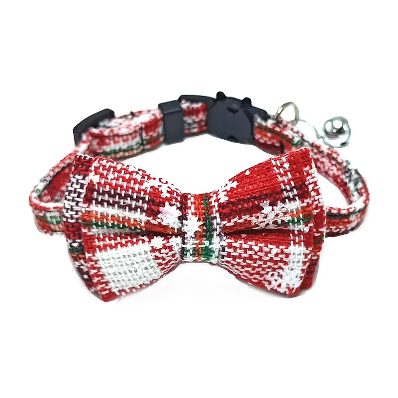 Red and white plaid bow tie cat collar with bell on a white background
