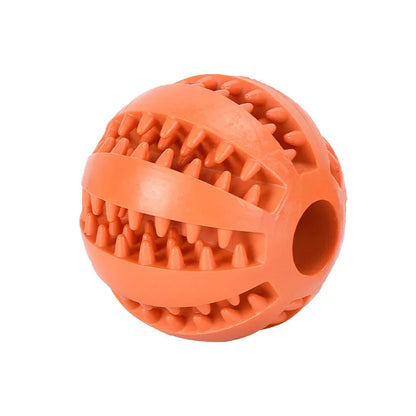 Orange rubber ball with textured surface on a white background