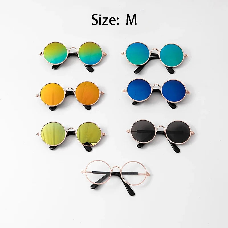 Set of colorful round sunglasses on a white background