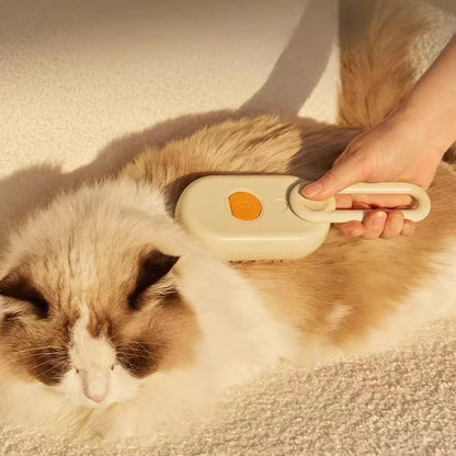 Person using a pet grooming brush on a fluffy cat