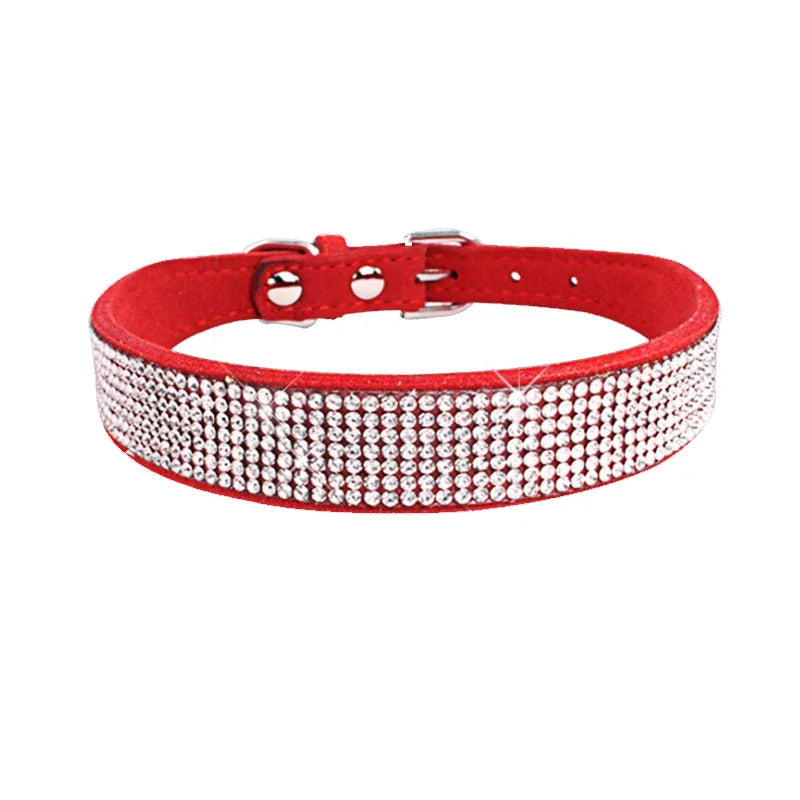 Red dog collar with rhinestone embellishments on a white background
