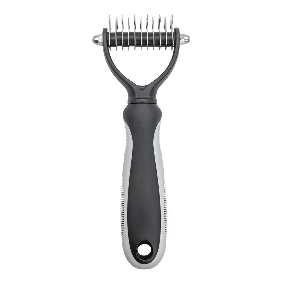 Black and silver pet grooming tool on a white background