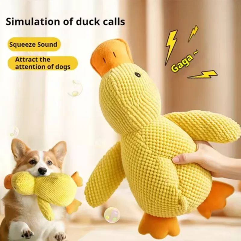Yellow duck-shaped toy with a dog playing with it, on a neutral background.