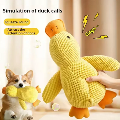 Yellow duck-shaped toy with a dog playing with it, on a neutral background.