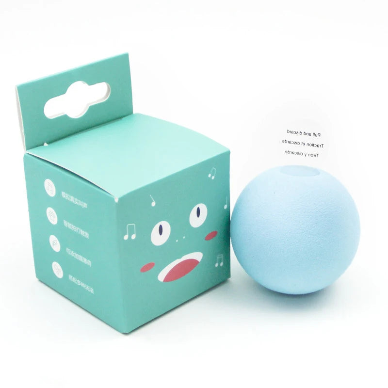 Blue stress ball with a cartoon face on a matching blue box packaging.