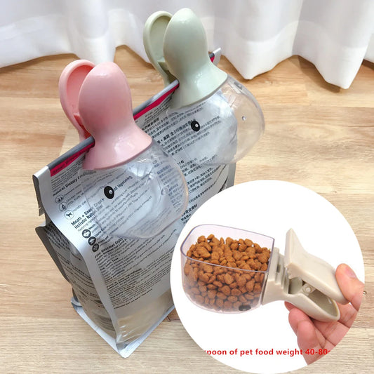 Pet food scooper with packaging on a wooden surface
