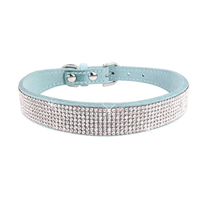 Light blue dog collar with rhinestone detailing on a white background