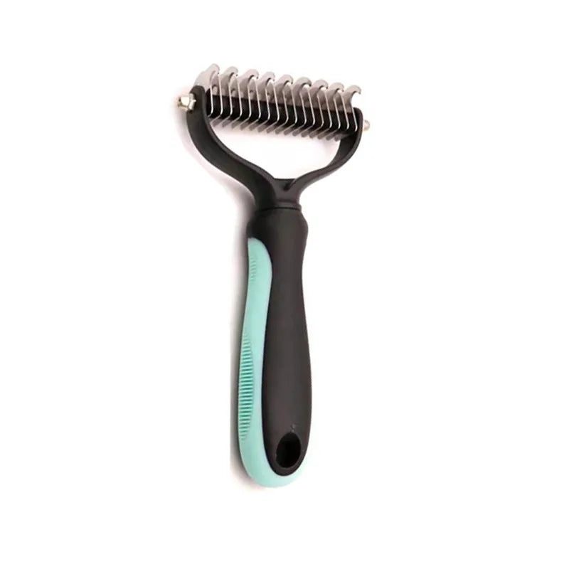 Pet grooming brush with black handle and teal grip on a white background