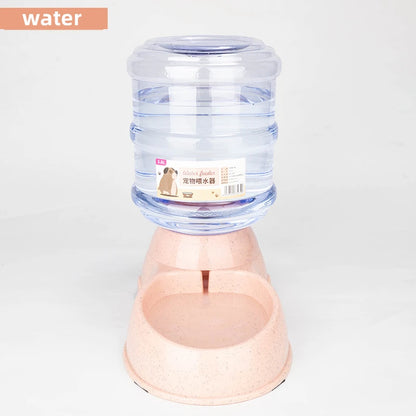 Pet water dispenser with a clear container and pink base on a white background