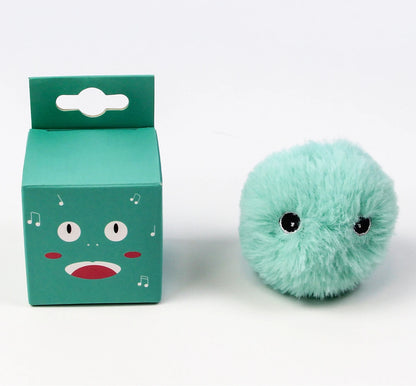 Teal plush toy with a matching box on a white background