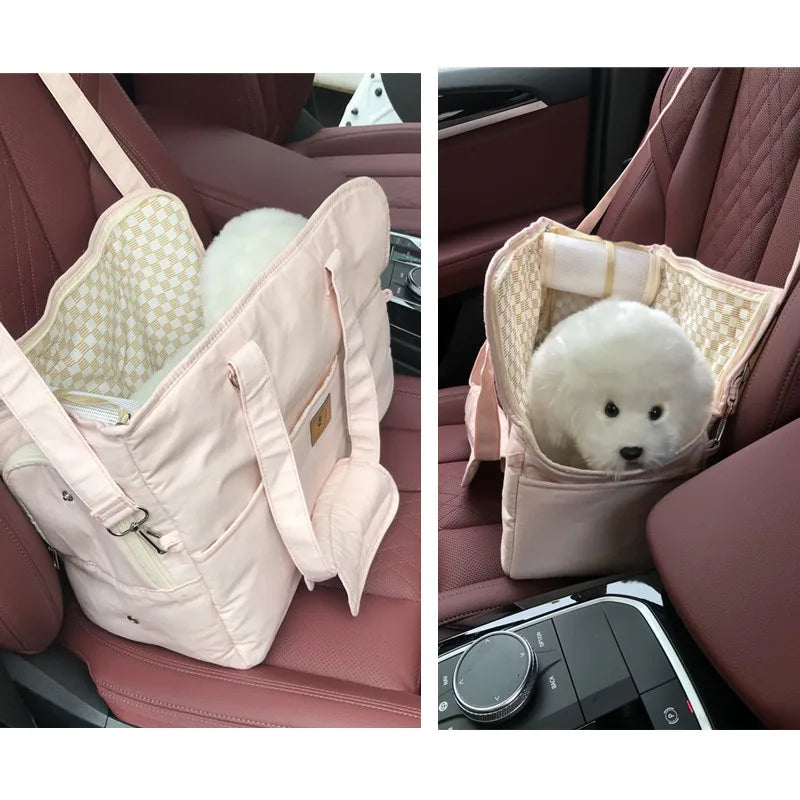 Pet carrier for small animals in a car seat, with a white fluffy animal inside.