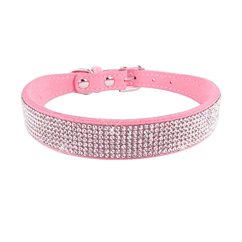 Pink dog collar with rhinestones on a white background