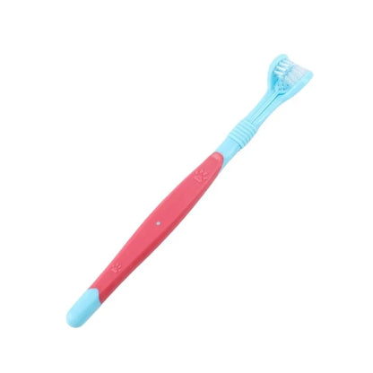 Children's toothbrush with pink handle and blue bristles on a white background
