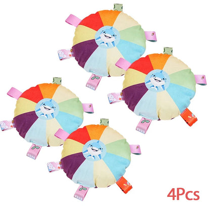 Set of four colorful circular toys with cartoon character on a white background