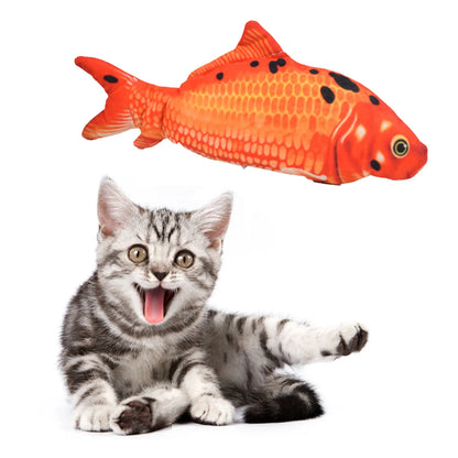 Cat playing with a fish-shaped toy on a white background