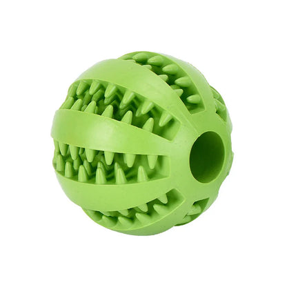 Green rubber ball with textured surface on a white background