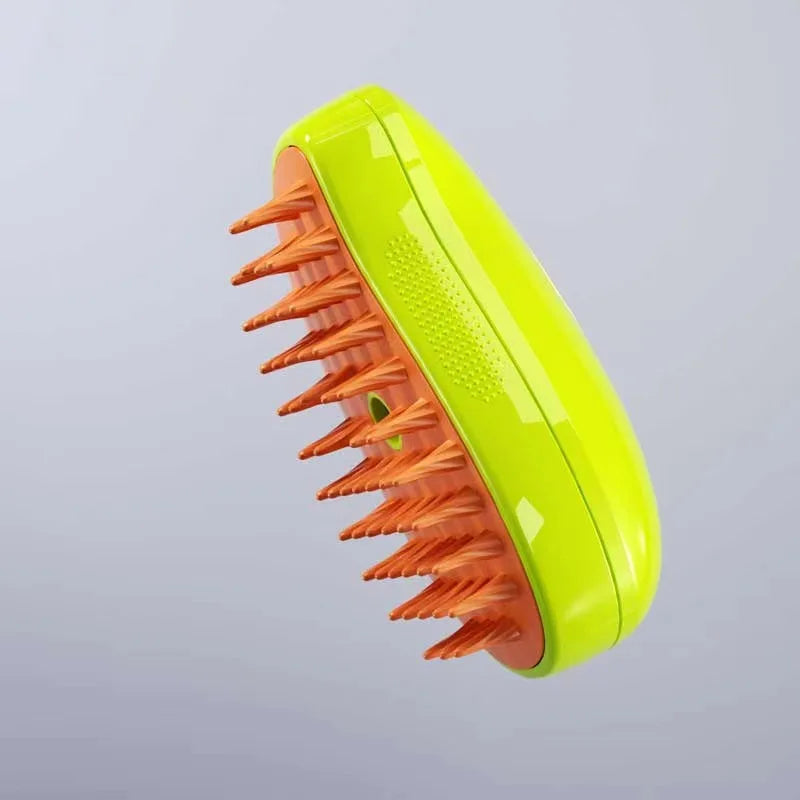 Green and orange scalp massager on a light gray background