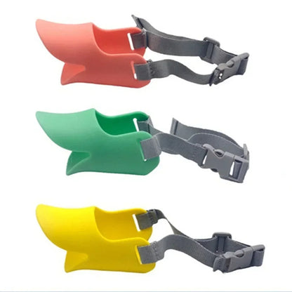 Three colorful dog muzzles with gray straps on a white background